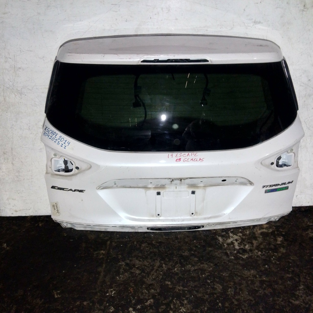 COMPUERTA ESCAPE 2014