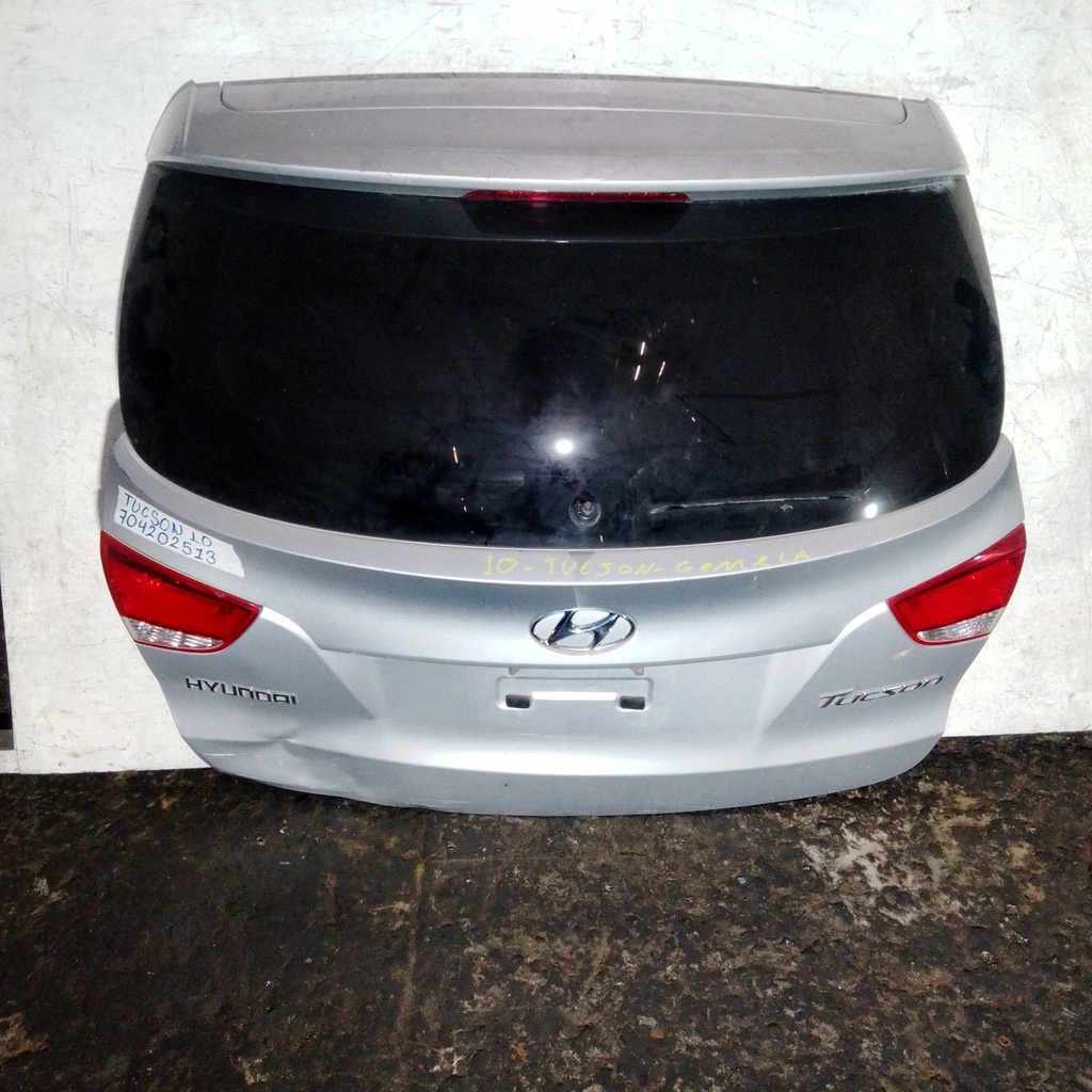 COMPUERTA TUCSON 10