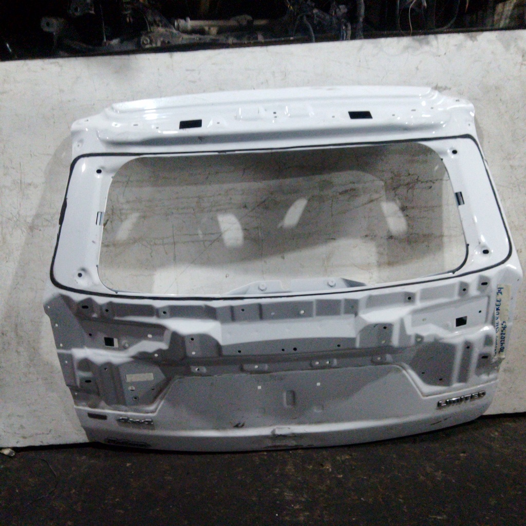 COMPUERTA GRAND CHEROKEE 24