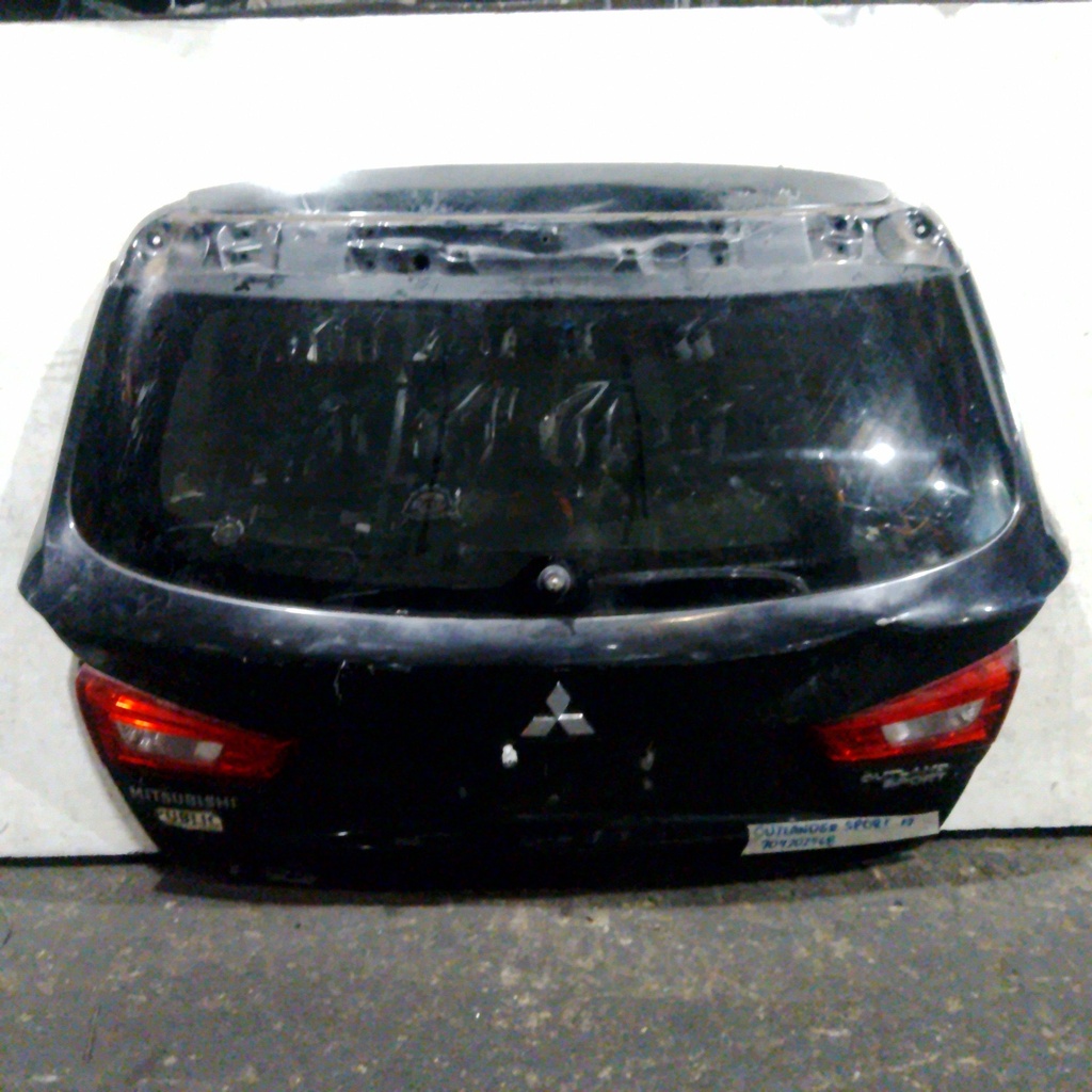 COMPUERTA OUTLANDER SPORT 17