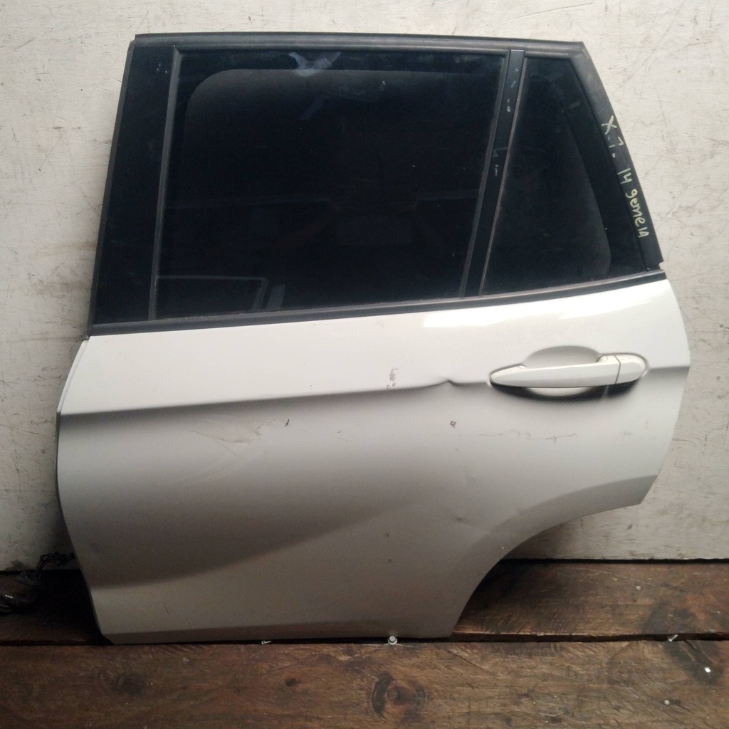 PUERTA TLH BMW X1 14