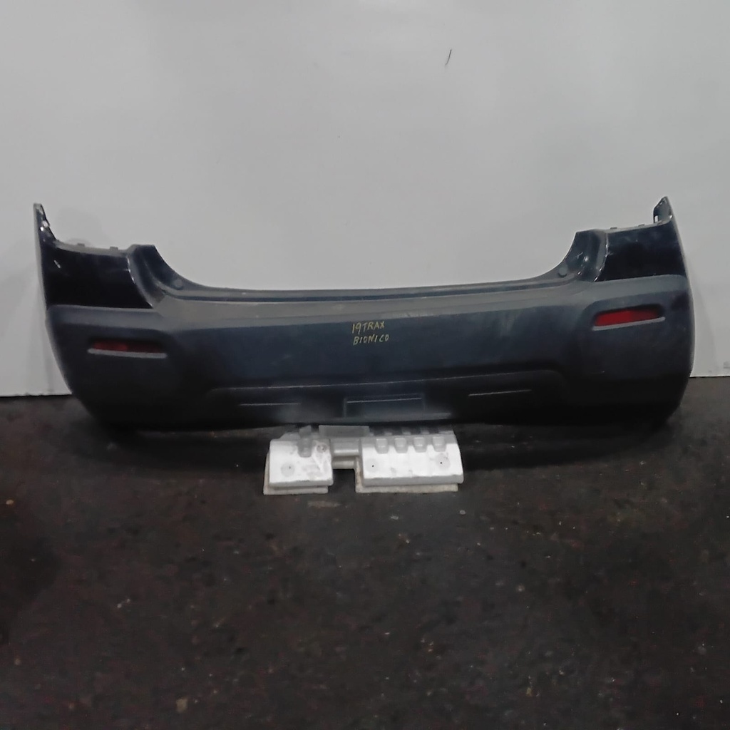 BUMPER TRASERO USADO TRAX 19