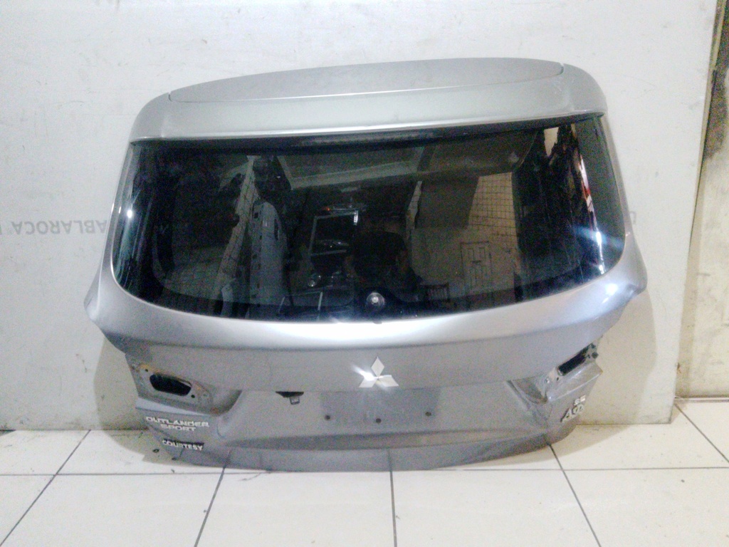 COMPUERTA OUTLANDER SPORT 20