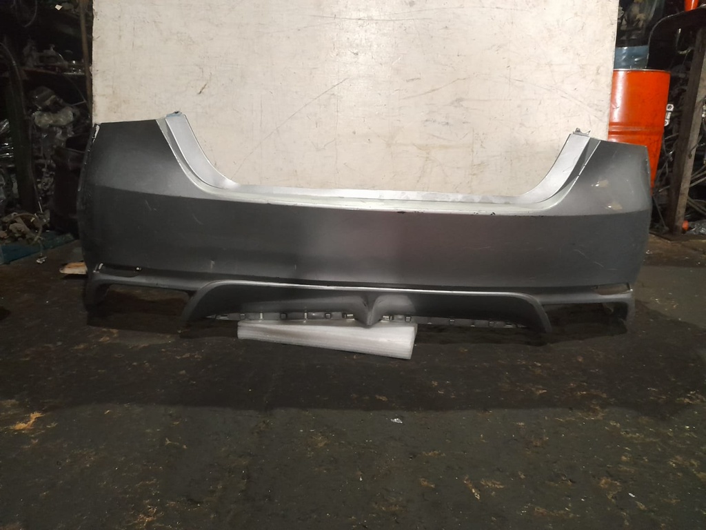 BUMPER TRASERO CAMRY 18-24