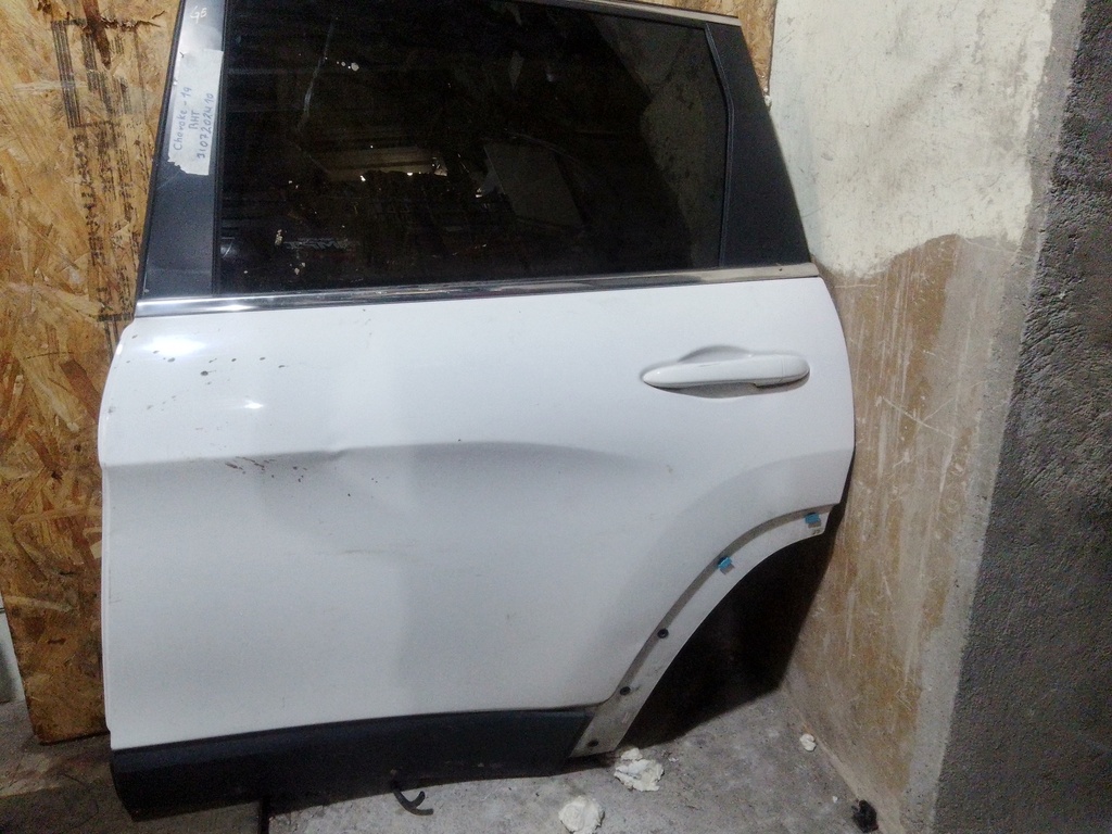 Puerta trasera Cherokee -19 LH