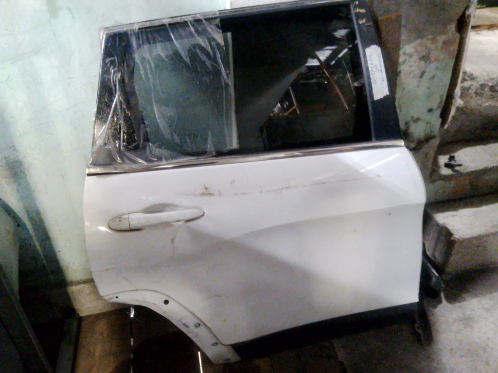 Puerta trasera Cherokee -19 RH